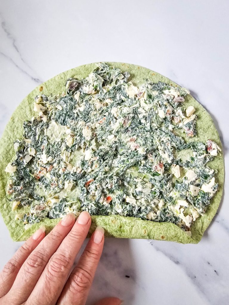 Spinach dip pinwheels in process 5.