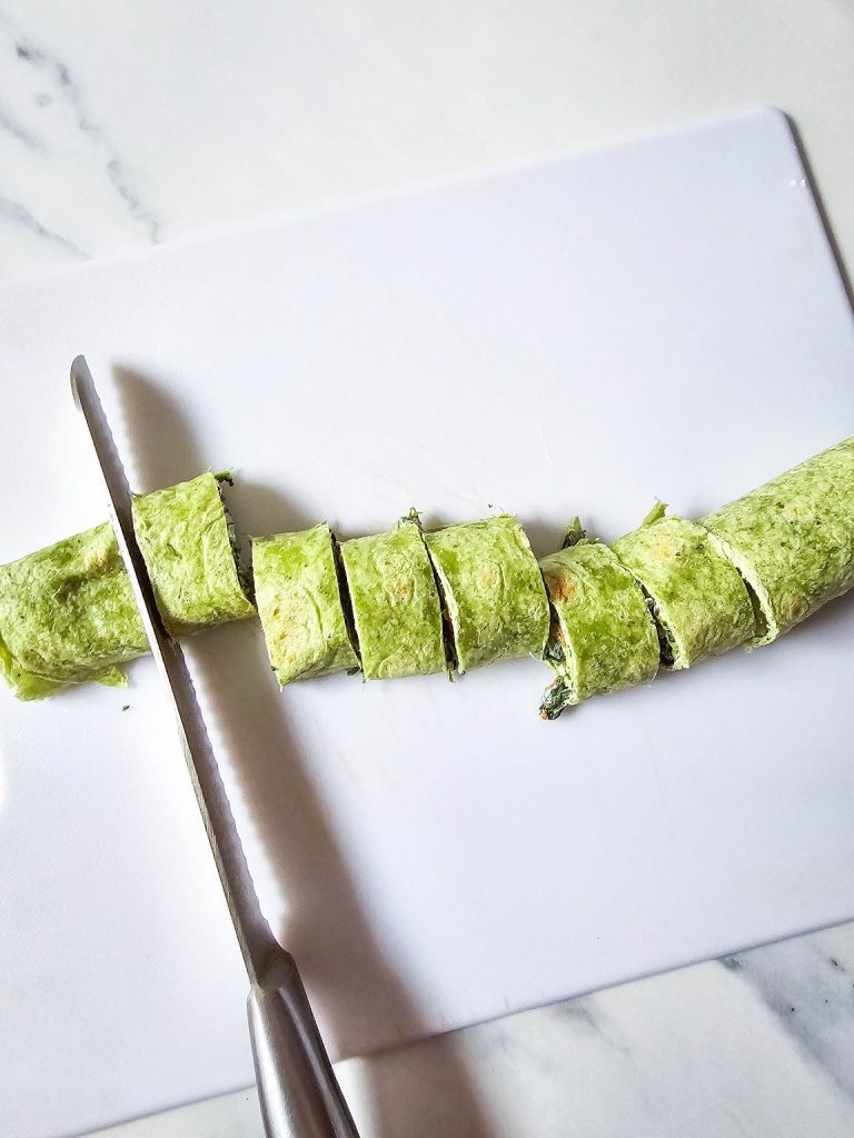 Spinach dip pinwheels in process 7.