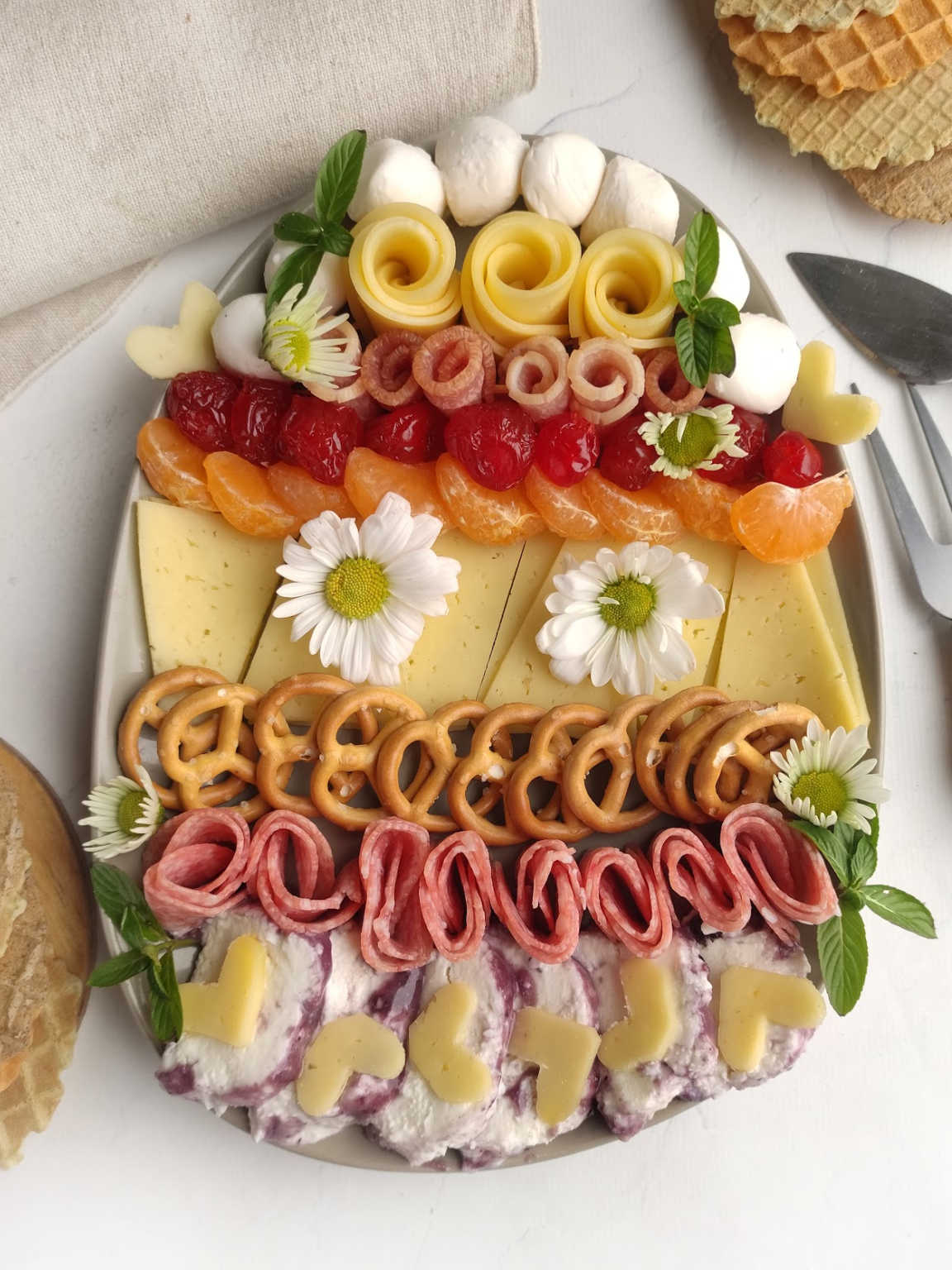 Easter egg shaped charcuterie board