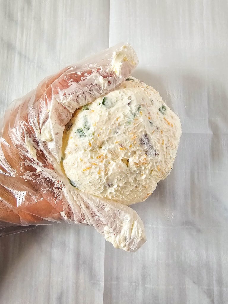 Jalapeno popper mixture formed into a cheese ball.