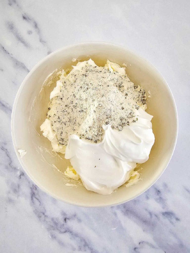 Creamy dip base in a serving bowl.