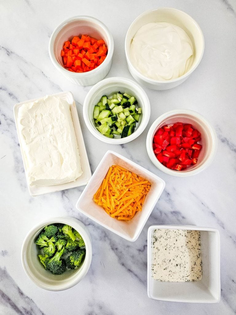 Veggie pizza dip ingredients.
