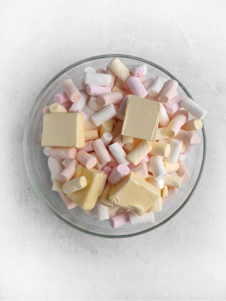 Marshmallows and butter in a bowl.