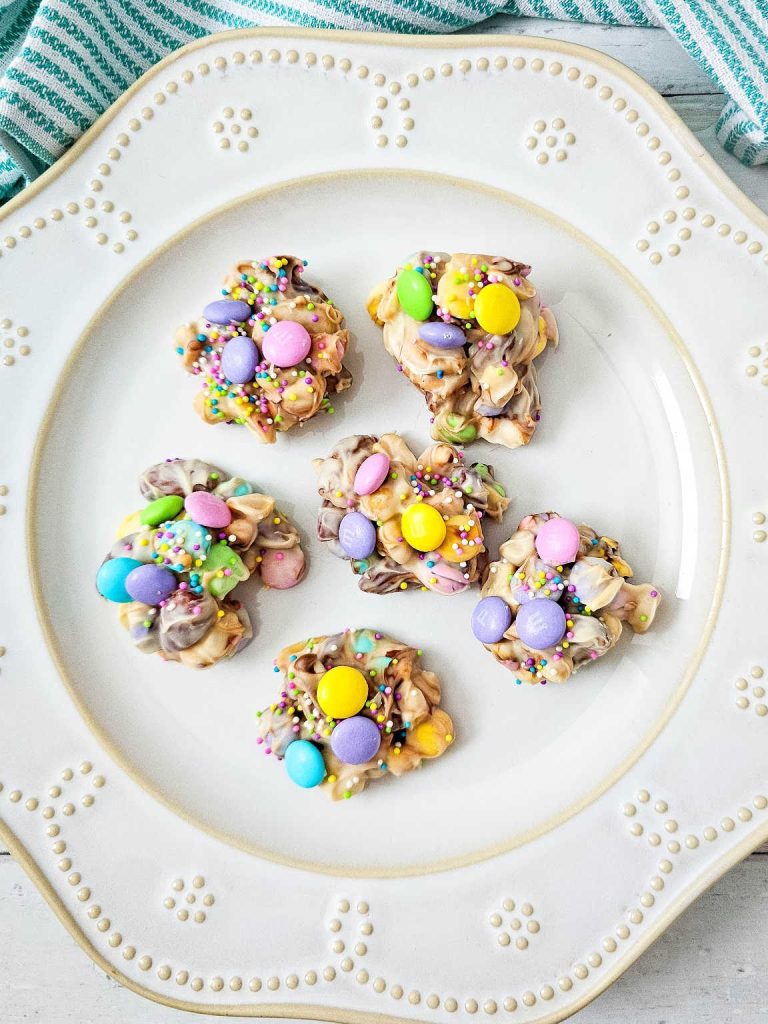 Easter crockpot candies on a white platter.
