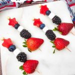 Red white and blue fruit skewers pin
