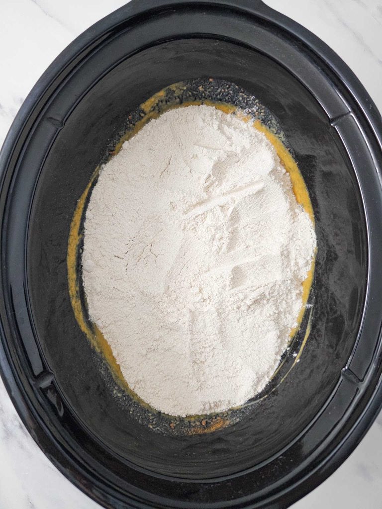 Crockpot pumpkin dump cake process 2