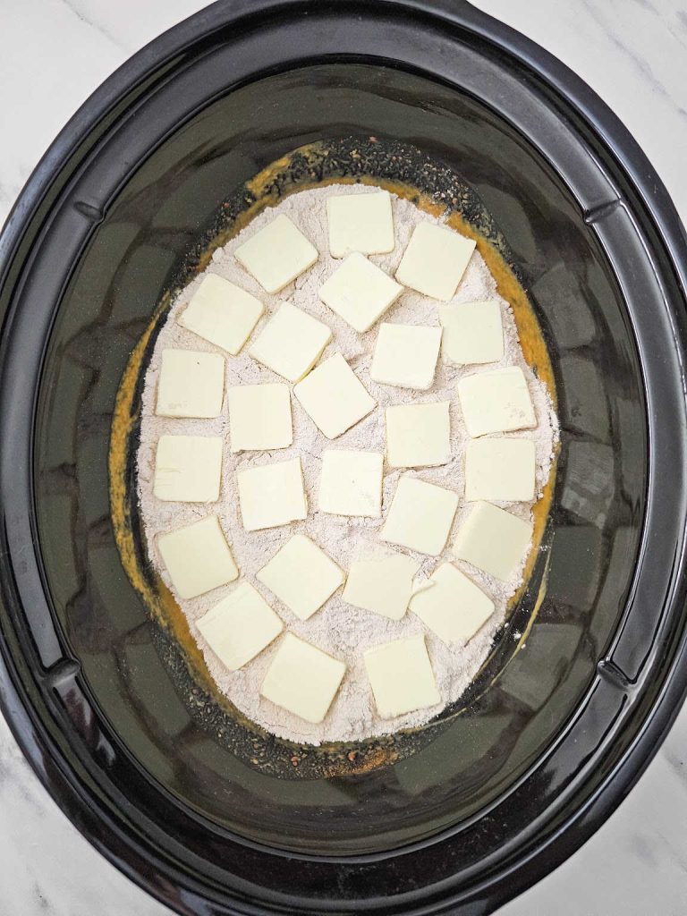 Crockpot pumpkin dump cake process 4