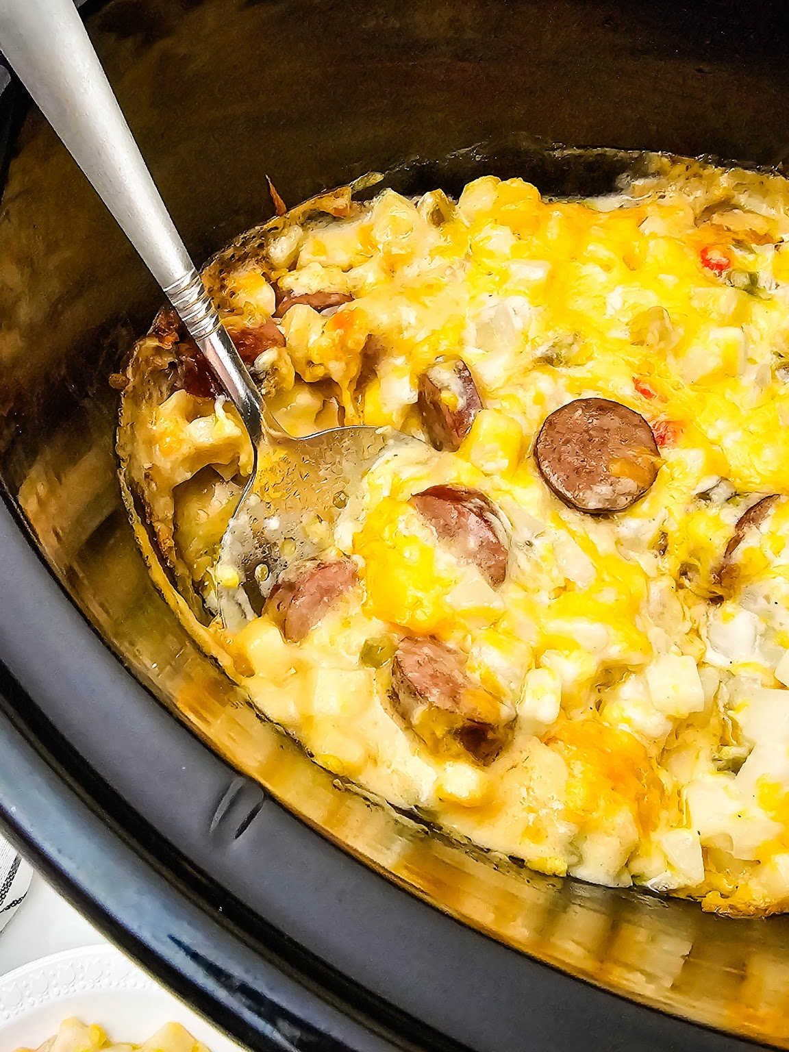 Crockpot cheesy sausage and potato casserole