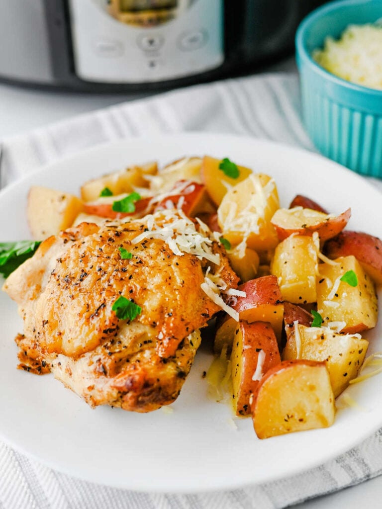 Slow cooker garlic parmesan chicken and potatoes